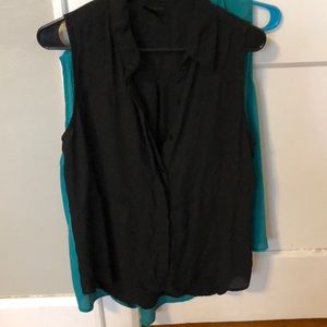 TWO sleeveless button up blouses